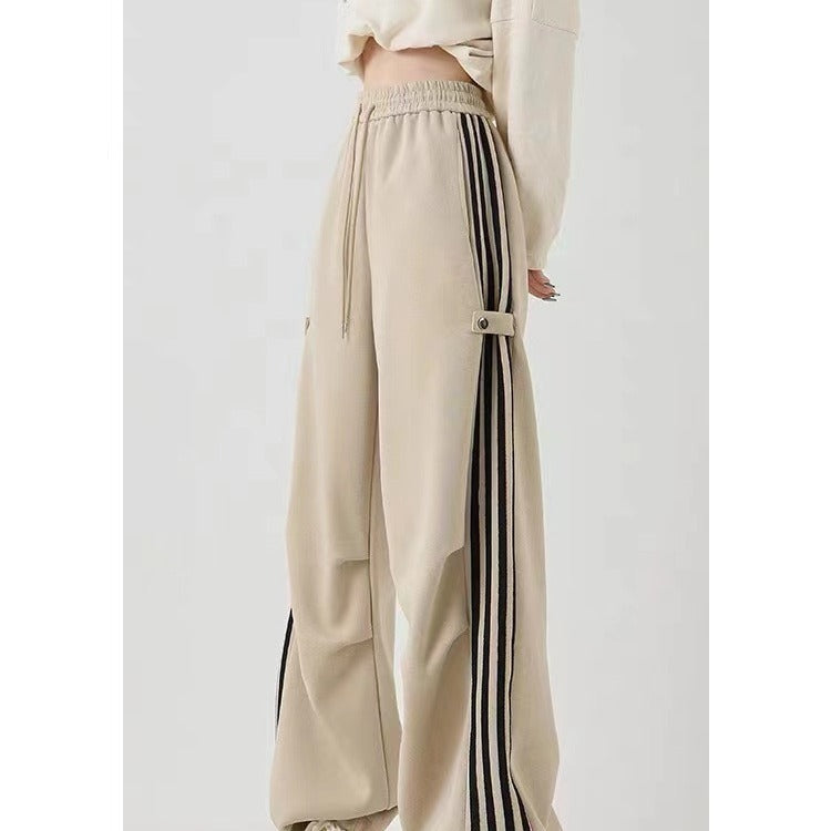 Wide-leg khaki cotton sweatpants with black stripes, perfect for summer workwear, high waist and casual style.