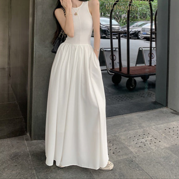 White long maxi dress for women, perfect for summer outings, featuring a round neck and high waist.