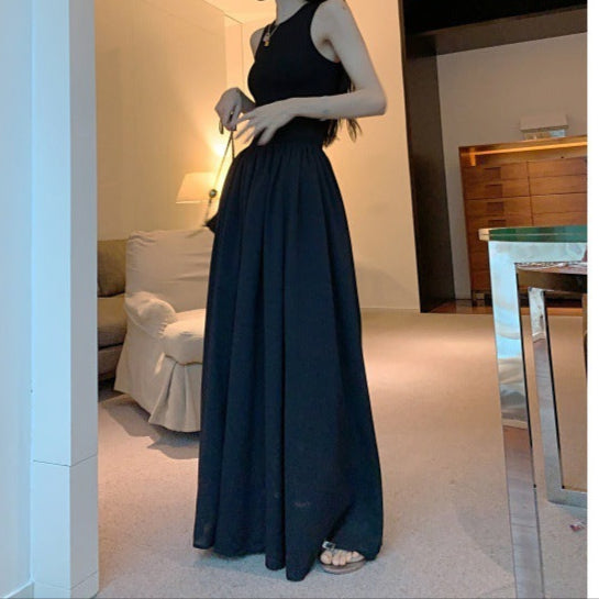 Elegant long black maxi dress for women, perfect for summer casual wear with a sleeveless design.